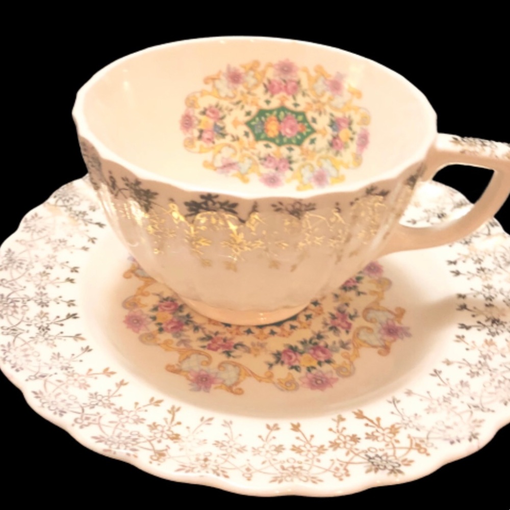 TeaCup and Saucer Set. By:Limoges 24k Gold Trim